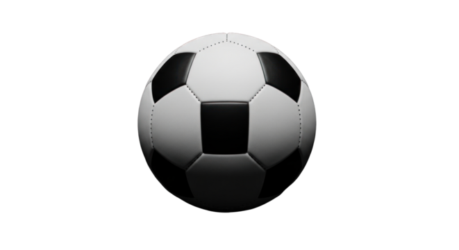 Dramatic monochrome soccer ball against stark black backdrop creates a captivating visual