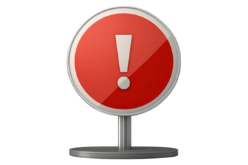 Warning sign featuring an exclamation mark on a metal base near a busy street intersection in an urban setting during daytime