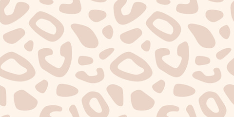 Minimalist leopard print. Vector seamless pattern with spots, organic shapes. Cut-out style animal skin texture, jaguar, cheetah, leo fur. Abstract light beige background. Repeating all-over design
