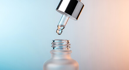Macro shot of a cosmetic dropper with a single drop of serum falling into an open frosted glass bottle against a gradient background