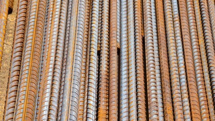 top view of rusty threaded rebar or iron or steel, construction materials, texture and background