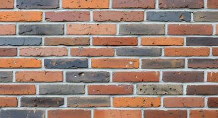 Obraz premium Textured brick wall background offers rustic charm and architectural detail for design projects
