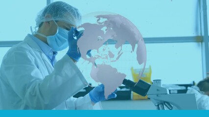 Animation of globe over caucasian male doctor in lab - Powered by Adobe