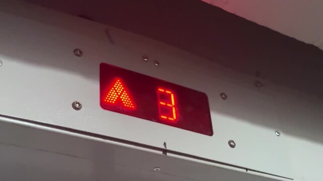 Digital indicator of elevator floors from 1st to 13th floor. Elevator in an old building. High 4k quality