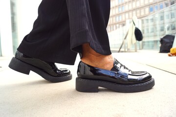 woman standing in shoes