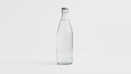 Clear Glass Bottle Filled with Sparkling Water on a White Background