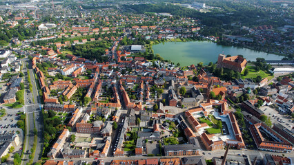A panorama Aerial view around the old town in the city of Kolding in Denmark on s sunny summer morning