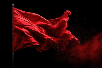 Symbolism of a red flag depicted clearly against a black background, capturing motion and emotional impact effectively in a powerful visual representation