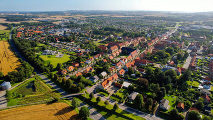 Aerial panorama of the downtown of the city Tyrstrup in Denmark on a sunny summer day.