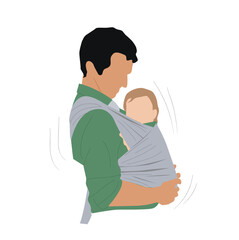 Happy young father carrying baby in sling. 