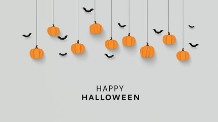 Halloween Decorations: A festive composition with hanging pumpkins and bats on a light background, perfectly embodying the playful spirit of the holiday.