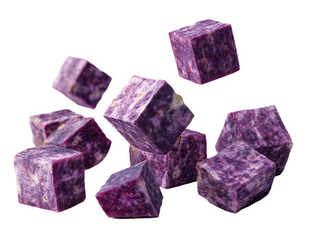 Falling purple yam cubes isolated on white background