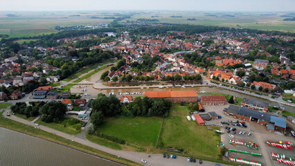 Aerial panorama of the downtown of the city Tönning in Germany on a sunny summer day.