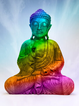 Buddha statue with rainbow chakra colors meditation spiritual