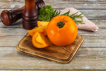 Organic juicy ripe yellow tomatoes