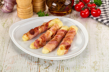 Hot mozzarella sticks with bacon