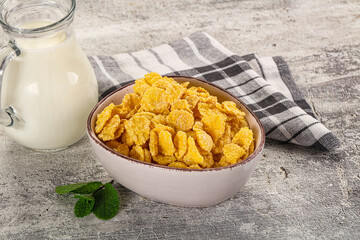 Corn flakes with milk for breakfast