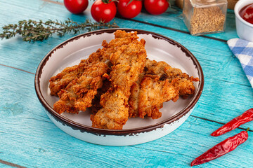 Golden crispy fried chicken strips