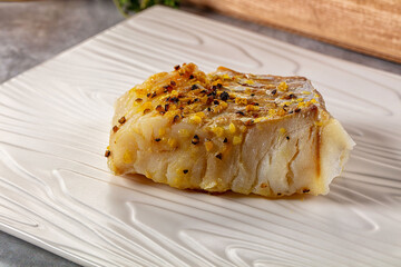 Steamed cod fish fillet with spices