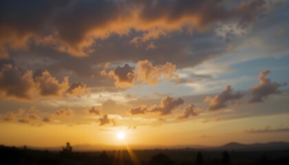Obraz premium Defocused Sunset Sky Background with Warm Natural Colors for Serene and Atmospheric Design Projects