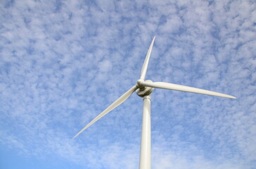 wind turbine against blue sky