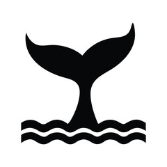 Black silhouette of a whale tail fin emerging from wavy water © shah