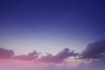 Fototapeta premium Serene twilight sky with wispy clouds and distant stars