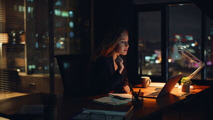 Evening director talking laptop web camera gesturing in modern office closeup