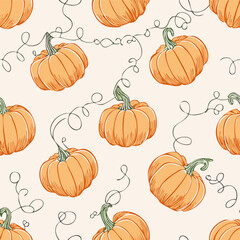 Seamless autumn pattern with orange pumpkins, green leaves, and decorative dots. Cozy seasonal design perfect for fall, Thanksgiving, and harvest themes