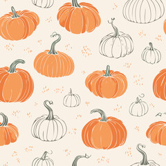 Seamless autumn pattern with orange pumpkins, green leaves, and decorative dots. Cozy seasonal design perfect for fall, Thanksgiving, and harvest themes