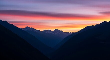 Fototapeta premium Mountain Peaks at Sunset - A Majestic Landscape.