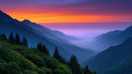 Fototapeta premium Mountain Sunset: A vibrant sunset paints the sky in hues of orange and purple, casting a warm glow over a majestic mountain range.