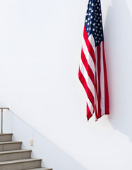 American Flag on a White Wall. isolated with white highlights