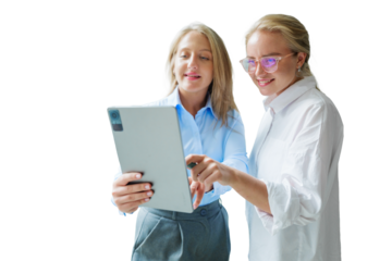 Collaborative discussion between two professionals examining a tablet in a modern office environment