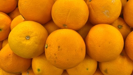 A Close-up View of a Pile of Bright Oranges