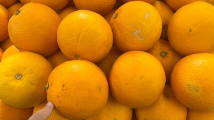 A Close-up View of a Pile of Bright Oranges