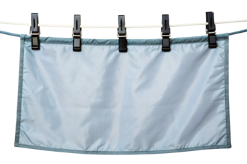 Blank gray fabric banner hanging from a clothesline with clips isolated with transparent background