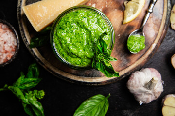 Homemade Pesto Sauce in a Jar with Fresh Ingredients