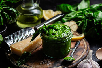 Homemade Pesto Sauce in a Jar with Fresh Ingredients