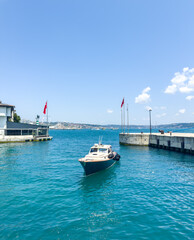 Boat on a boat trip in a picturesque bay, sunny day.