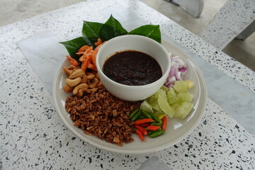 Miang Kham. Snacks. Vegetable food. sweet. thaifood. food. vegetable. coconut. dried shrimp. shallots. lemon. bean. vegetarian. betel. Thai desserts. eat. delicious. flavour. appetizer. cooking. herb.