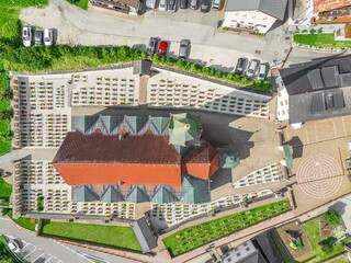 Aerial view of church and cemetery grounds in Santa Cristina Valgardena. South Tyrol, Italy