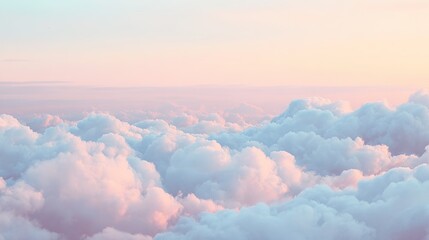 Fototapeta premium The serene sky, with fluffy white clouds bathed in pale blues and pinks, evokes tranquility and calmness, symbolizing peace, tranquility, and harmony with nature's beauty.