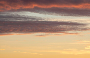 Colorful dramatic sunset sky with clouds.