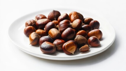 Obraz premium Lustrous Harvested Chestnuts with Rich Brown Shells on a Minimalist White Plate