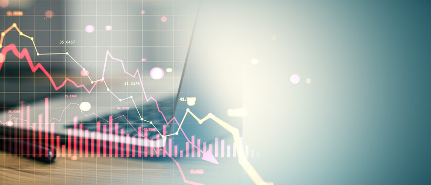 Business financial crisis concept with red downward graphs on laptop screen, symbolizing global market crash and economic recession impact.