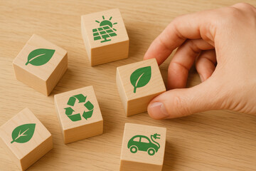 Eco friendly concept with wooden blocks showing green leaf and electric car