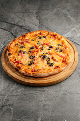 Freshly baked pizza with golden crust, melted cheese, and assorted toppings. Hot and delicious Italian dish served straight from the oven