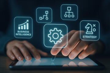 Business intelligence strategy concept with digital icons and hand using tablet