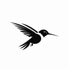 Obraz premium Elegant small hummingbird soars with grace, a captivating black silhouette